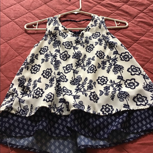 A floral white and blue top from Lily Bleu. - Picture 1 of 2